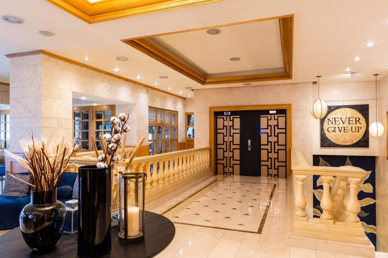 Hotel Le Châtelain Brussel Buitenkant foto The lobby of the hotel