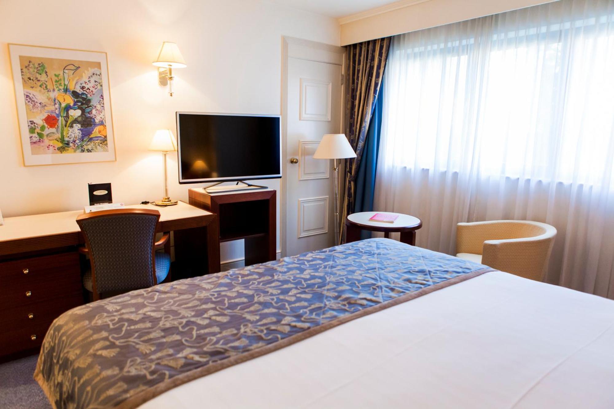 Hotel Le Châtelain Brussel Buitenkant foto A room at the hotel