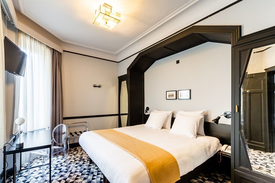 Hotel Le Châtelain Brussel Buitenkant foto A room at the hotel